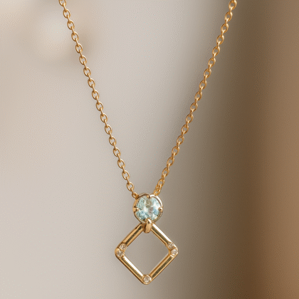 Modern Geometric Gold Pendant Necklace with Blue Stone Accent